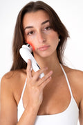 4 in 1 RF EMS Multifunctional Facial Massager demonstrating facial rejuvenation and toning.